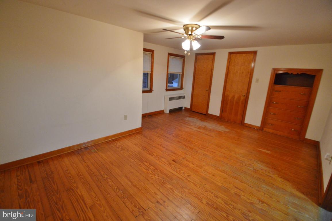 9 Hossler Road Manheim, PA 17545 - Photo 17 of 19 wooden floor in an empty room with a window