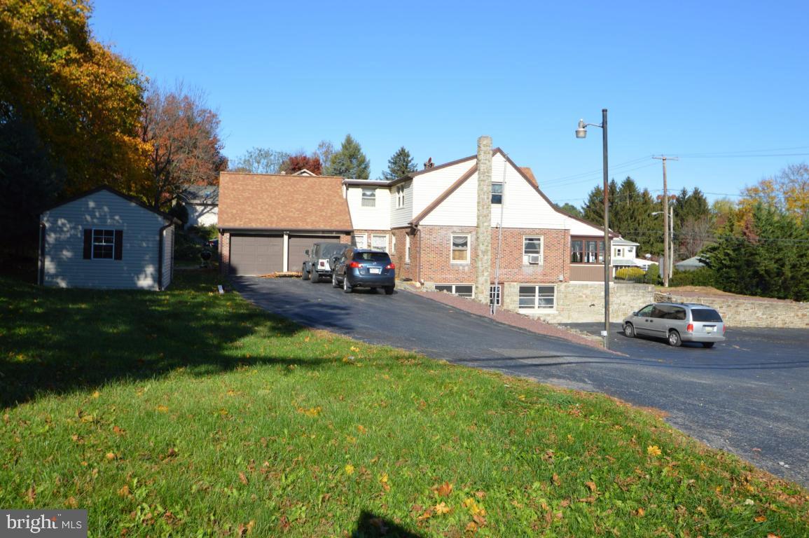 9 Hossler Road Manheim, PA 17545 - Photo 19 of 19 a front view of a house with a garden and yard