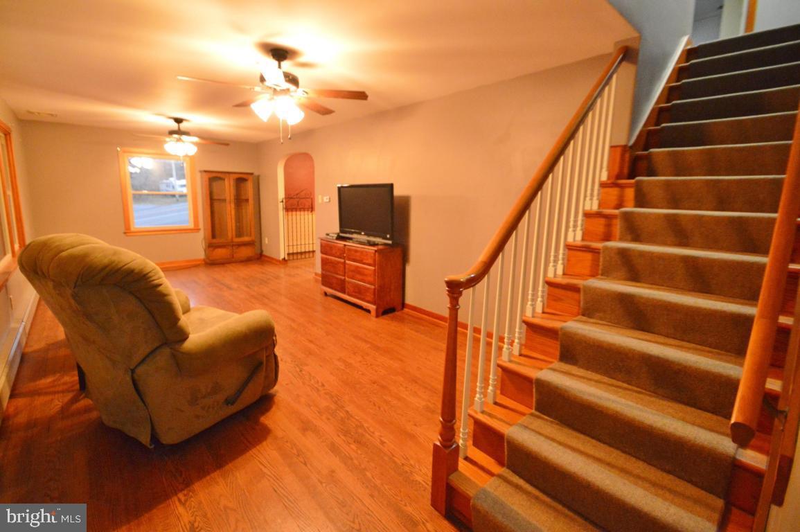 9 Hossler Road Manheim, PA 17545 - Photo 7 of 19 a view of entryway and hall with wooden floor