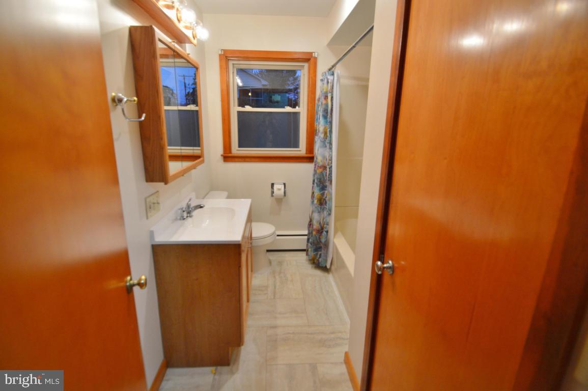 9 Hossler Road Manheim, PA 17545 - Photo 9 of 19 a bathroom with a sink and mirror