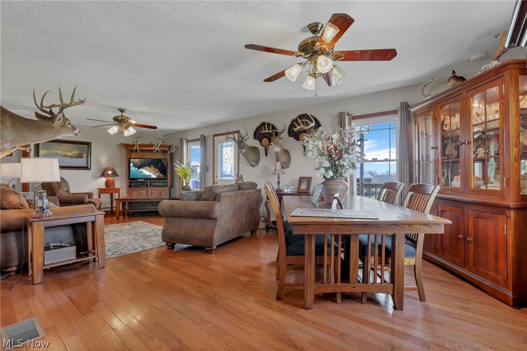 5502 Dutch Ridge Road New Straitsville, OH 43766 - Photo 16 of 49 Dining room with light wood-style flooring and a ceiling fan