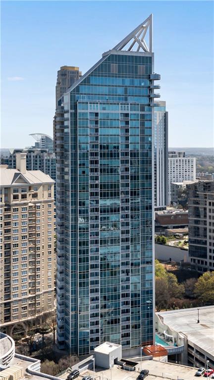 3338 Peachtree Road Northeast, Unit 1706 Atlanta, GA 30326 - Photo 12 of 37 a front view of a building with a street