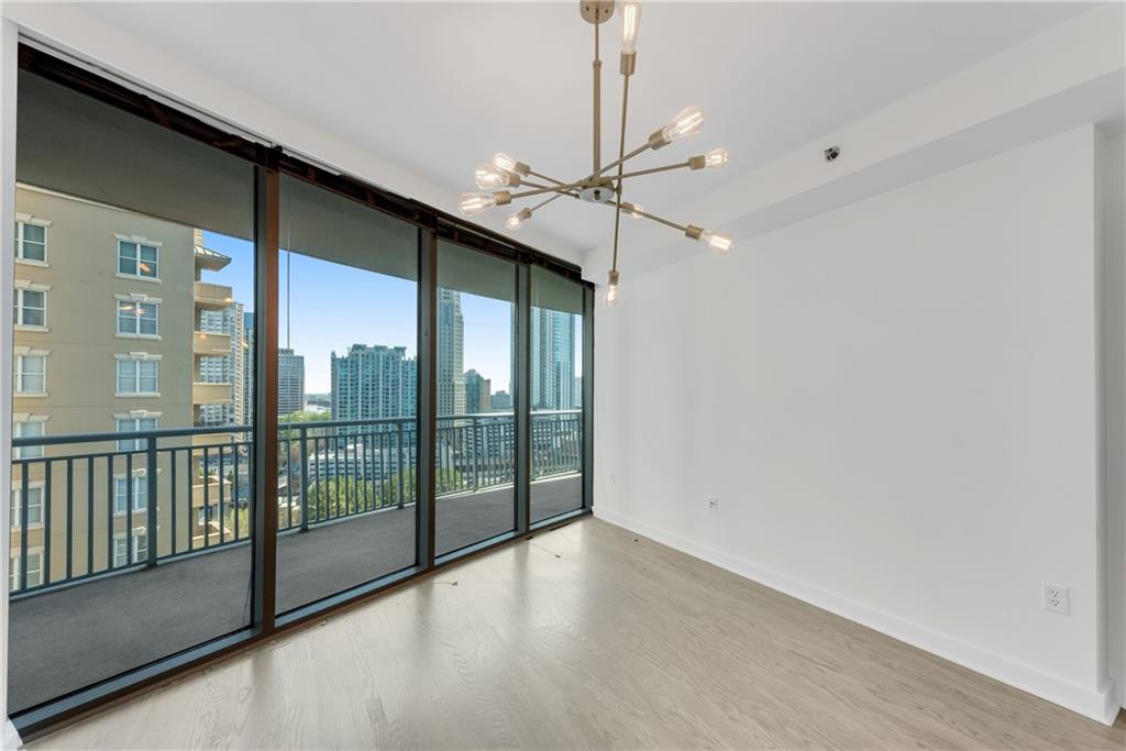 3338 Peachtree Road Northeast, Unit 1706 Atlanta, GA 30326 - Photo 16 of 37 a view of a room with a large window