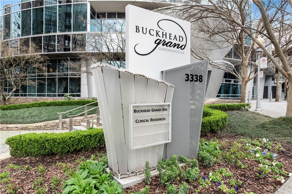3338 Peachtree Road Northeast, Unit 1706 Atlanta, GA 30326 - Photo 23 of 37 a view of a sign board with a yard