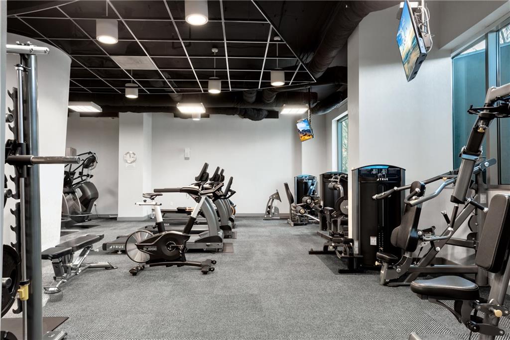 3338 Peachtree Road Northeast, Unit 1706 Atlanta, GA 30326 - Photo 26 of 37 a view of a room with gym equipment