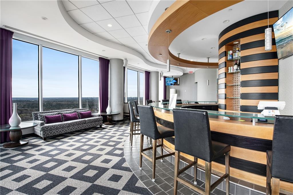 3338 Peachtree Road Northeast, Unit 1706 Atlanta, GA 30326 - Photo 31 of 37 a very nice looking dining room with a large window