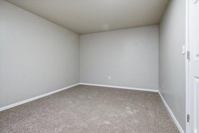 4496 West 11800 South South Jordan, UT 84009 - Photo 28 of 33 Spare room with carpet flooring and baseboards