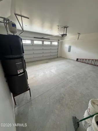 a view of a house with a snow in the yard