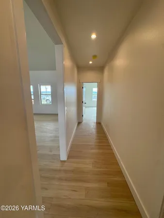 a bathroom with a double vanity sink and mirror