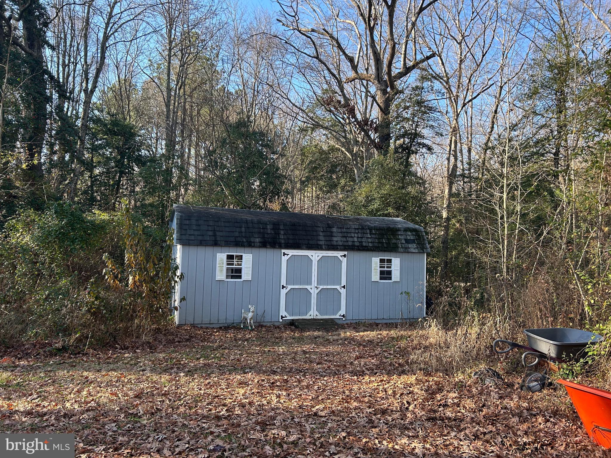 30423 Baynard Road Trappe, MD 21673 - Photo 9 of 25 a view of a house with a yard and tree s