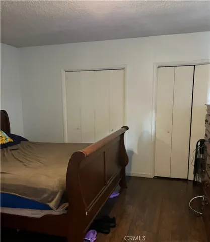 a kitchen with stainless steel appliances granite countertop a stove and a refrigerator