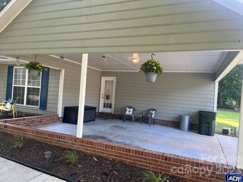 402 Split Oak Trail Gastonia, NC 28052 - Photo 12 of 23 a view of a house with backyard and porch