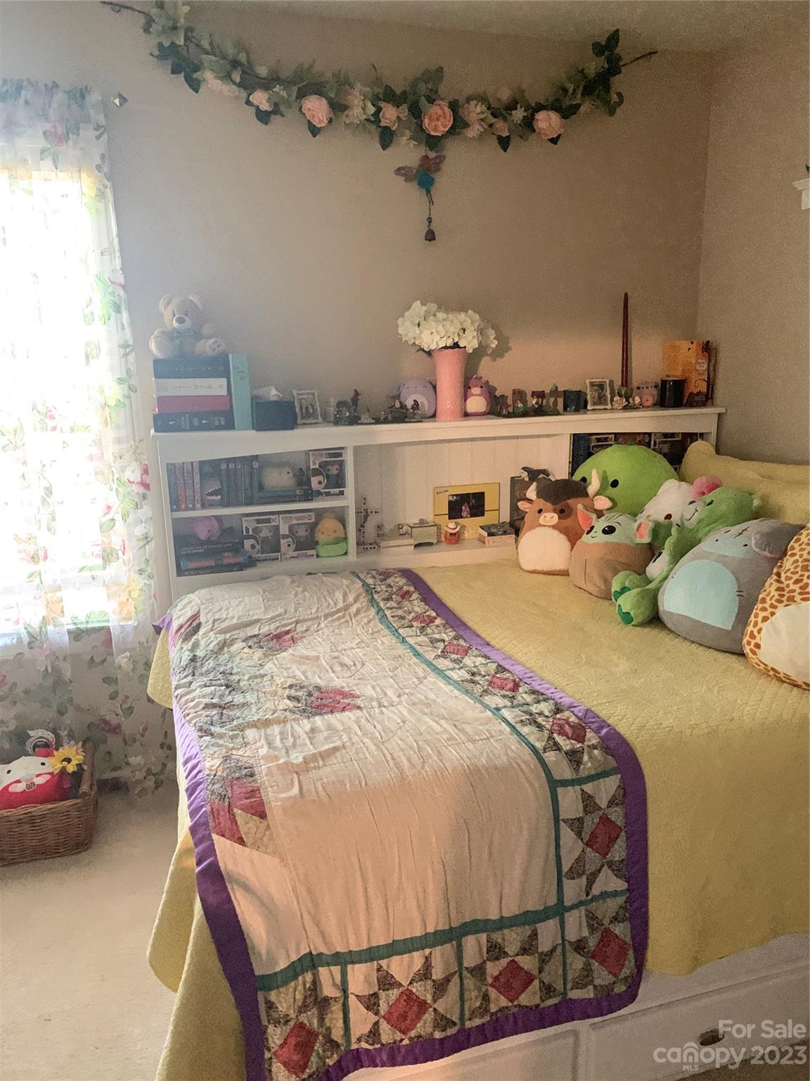 402 Split Oak Trail Gastonia, NC 28052 - Photo 17 of 23 a bed sitting in a bedroom next to a window