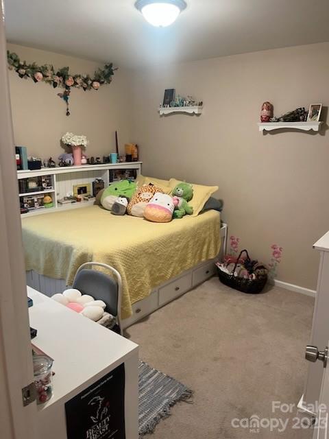 402 Split Oak Trail Gastonia, NC 28052 - Photo 22 of 23 a bedroom with a bed and a table