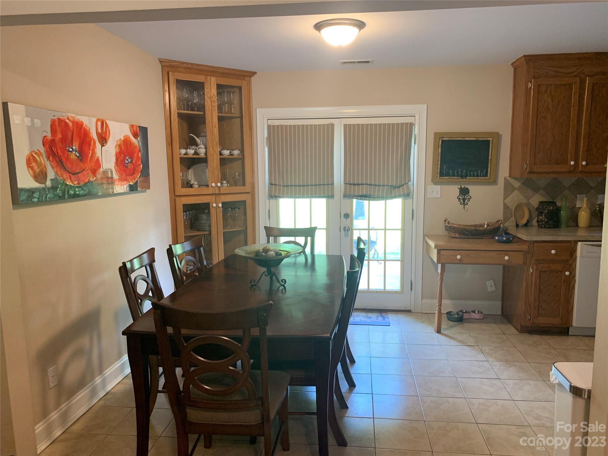 402 Split Oak Trail Gastonia, NC 28052 - Photo 7 of 23 a view of a dining room with furniture and window