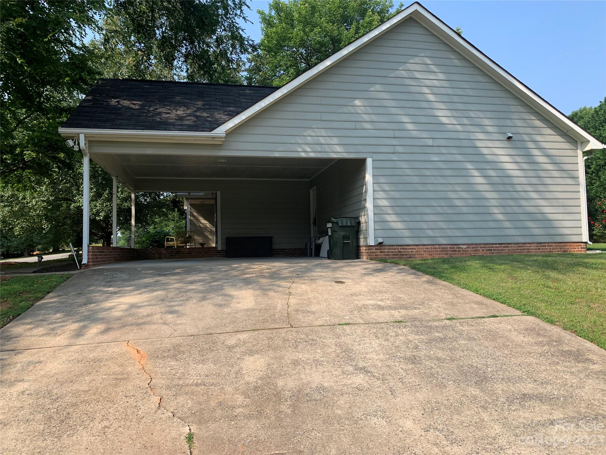 402 Split Oak Trail Gastonia, NC 28052 - Photo 10 of 23 a view of a house with a yard