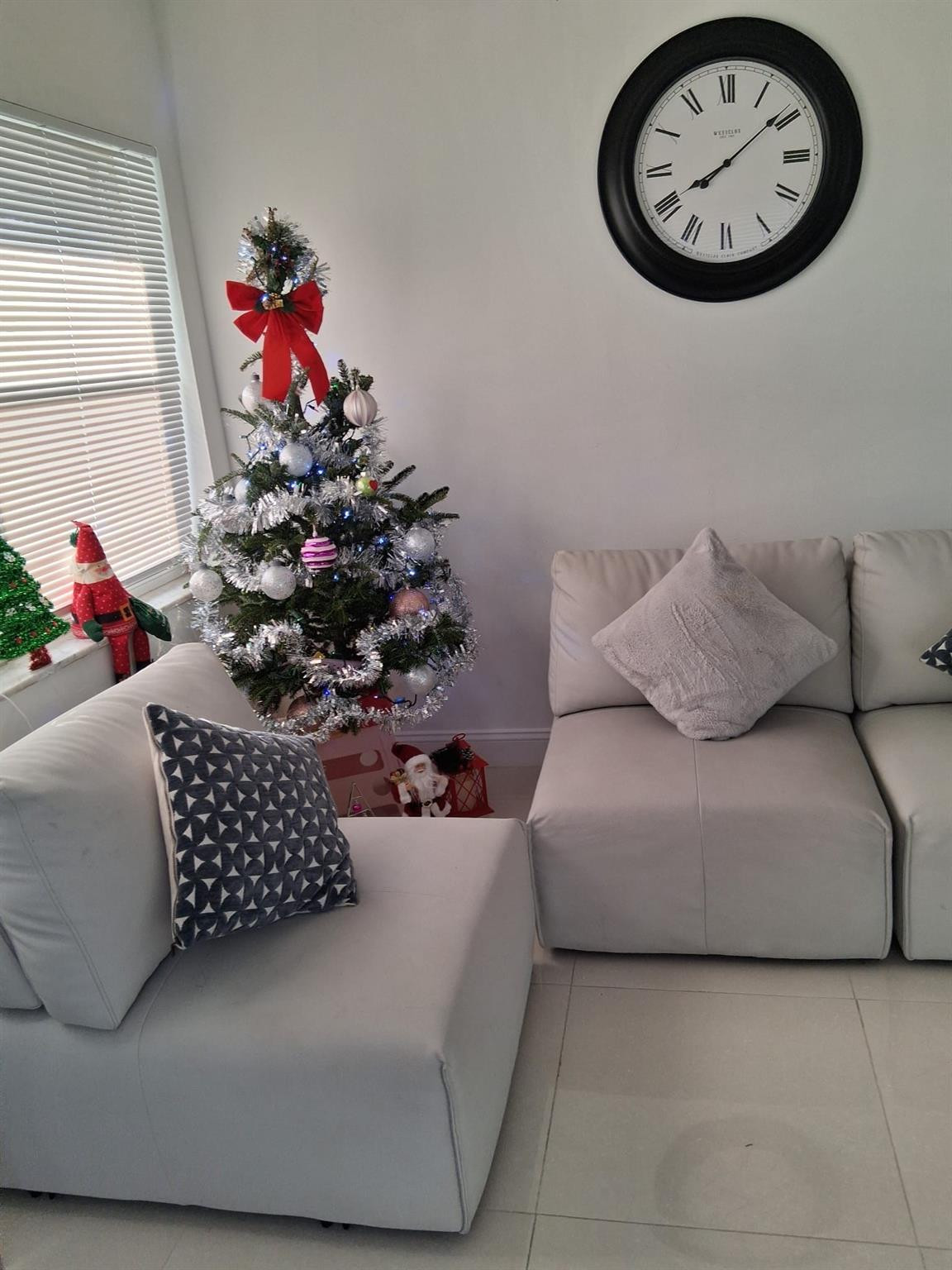 338 Southwest 15th Street, Unit 338 Dania Beach, FL 33004 - Photo 3 of 14 a living room with furniture and a couch