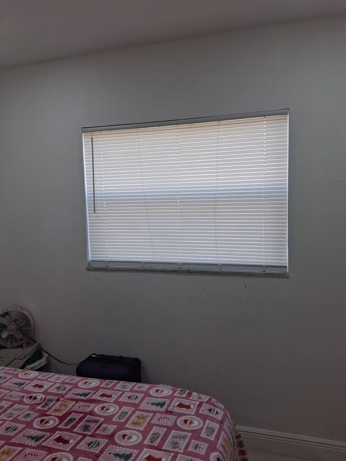 338 Southwest 15th Street, Unit 338 Dania Beach, FL 33004 - Photo 9 of 14 a bedroom with a bed and a window