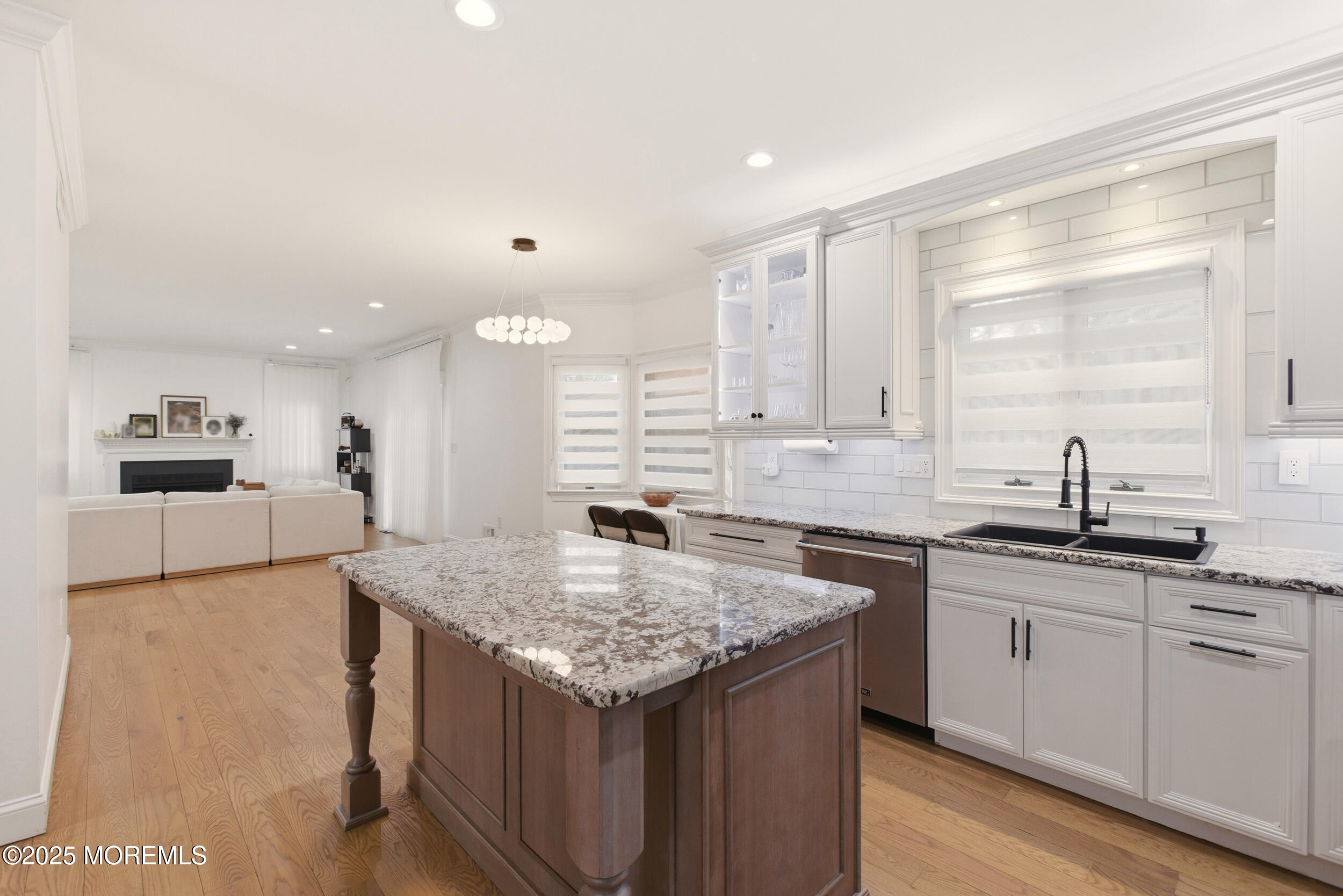 5 Overlook Drive Jackson, NJ 08527 - Photo 19 of 56 a kitchen with granite countertop kitchen island white cabinets and sink