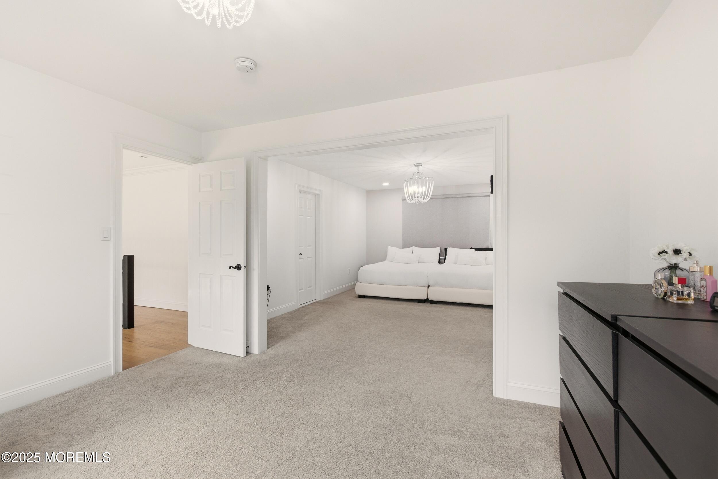 5 Overlook Drive Jackson, NJ 08527 - Photo 24 of 56 a living room with furniture and a mirror