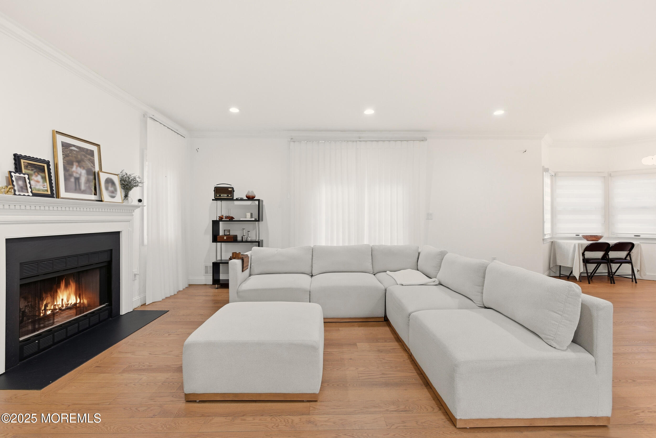 5 Overlook Drive Jackson, NJ 08527 - Photo 10 of 56 a living room with furniture a fireplace and a flat screen tv