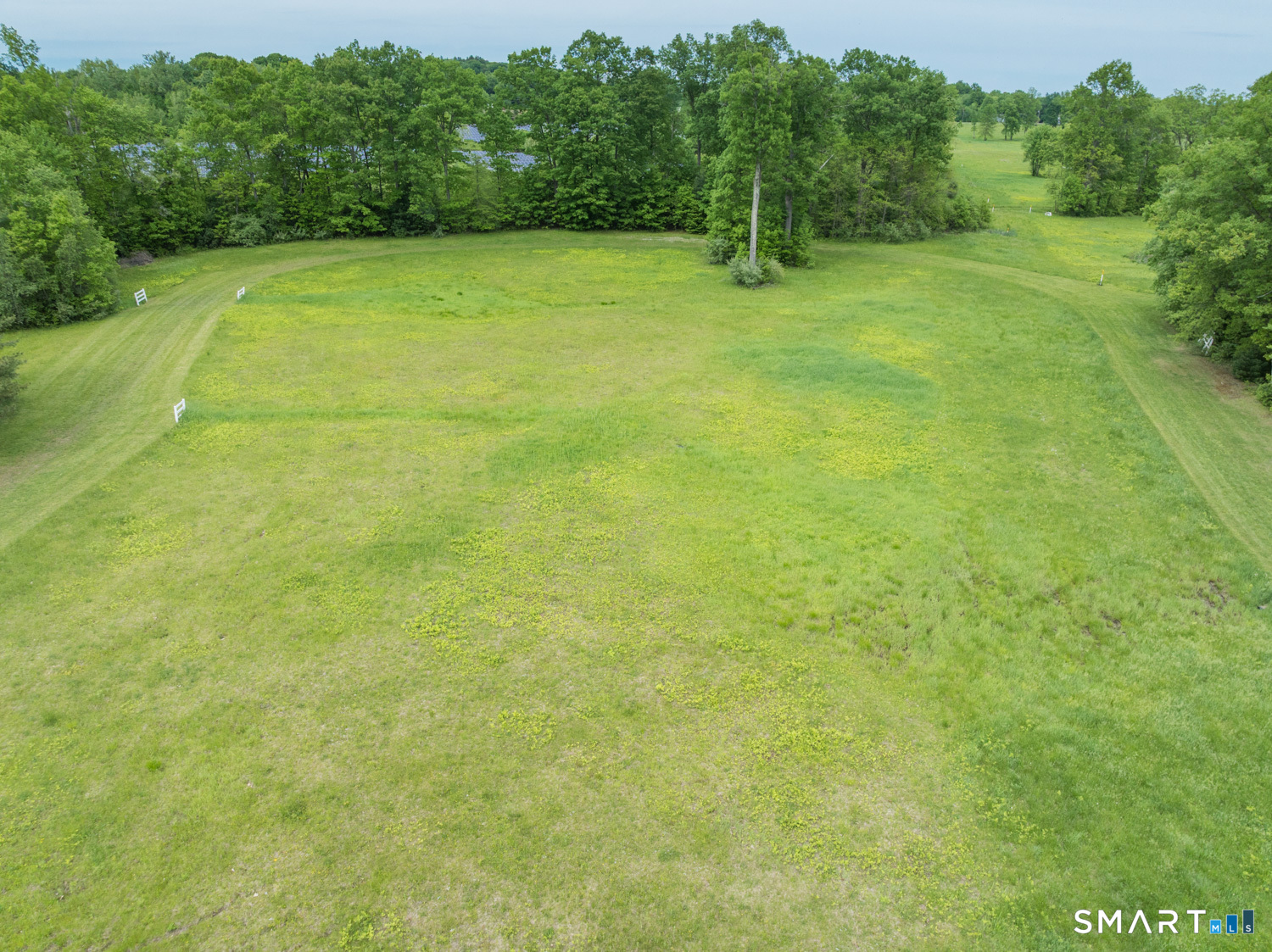 949 North Street Suffield, CT 06078 - Photo 8 of 33 a view of an outdoor space and a yard