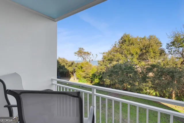a view of a balcony with an outdoor space