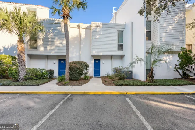 a front view of a house with swimming pool