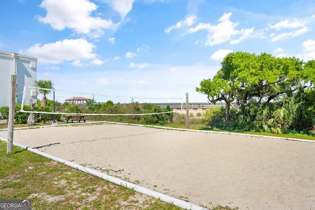 a view of swimming pool with a yard