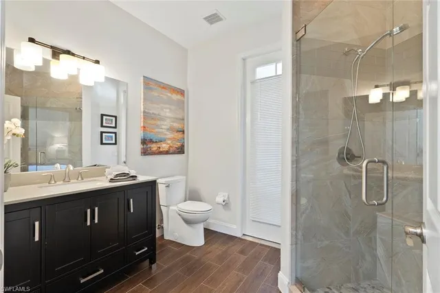 a view of a backyard with sitting area