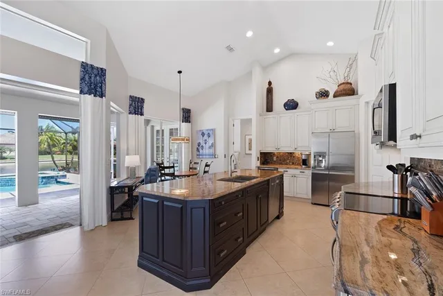 a bed room with a bed and large window