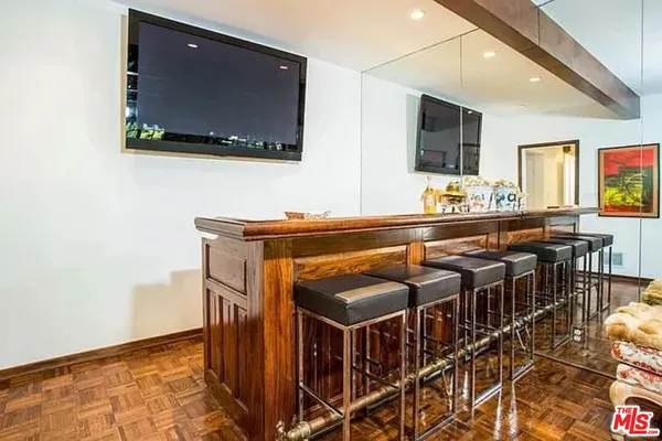 a view of a chairs and table in a kitchen