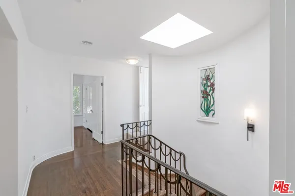 a view of entryway with wooden floor