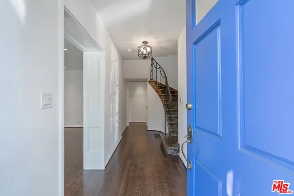 a view of a hallway with closet