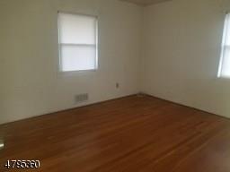 40 Sharon Avenue Edison, NJ 08817 - Photo 5 of 15 an empty room with a window