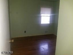 40 Sharon Avenue Edison, NJ 08817 - Photo 7 of 15 an empty room with a window