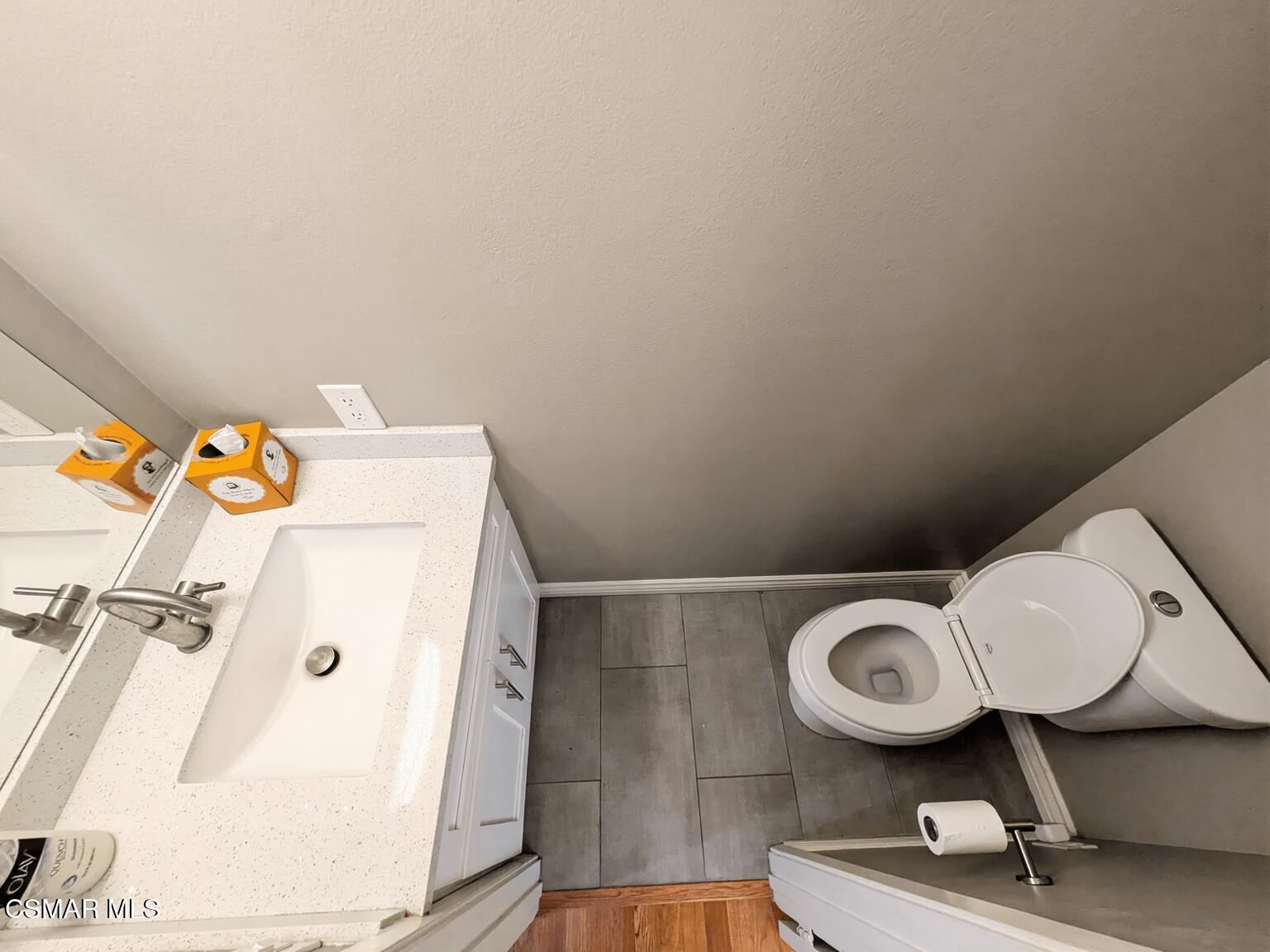28713 Conejo View Drive Agoura Hills, CA 91301 - Photo 12 of 28 a bathroom with a toilet and a sink