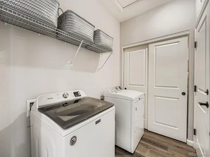 a utility room with washer and dryer