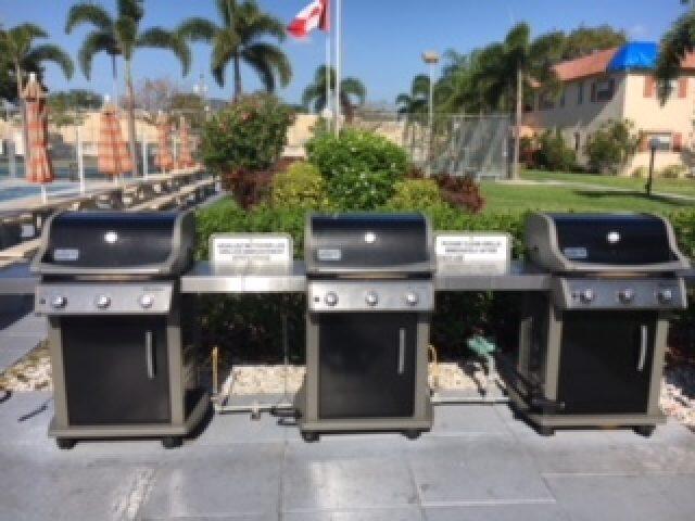 5680 Southwest 3rd Place, Unit 206 Margate, FL 33068 - Photo 22 of 22 a view of outdoor kitchen with outdoor seating