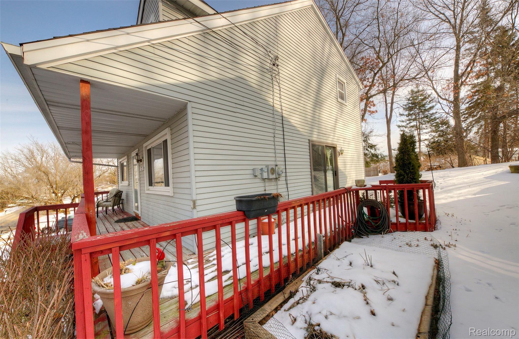 1131 Brighton Lake Road Brighton, MI 48116 - Photo 40 of 43 Wrap around porch