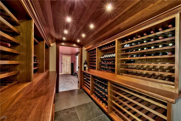 a view of a porch with furniture and a backyard