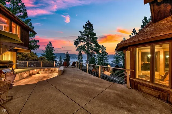 a view of a balcony with chairs