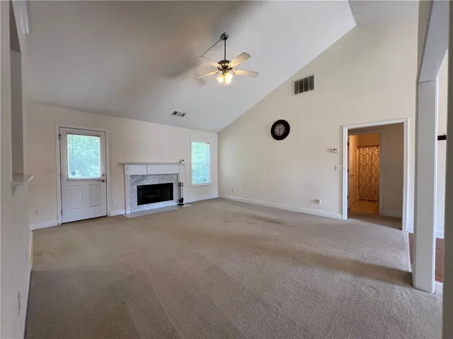 a kitchen with a stove and a microwave