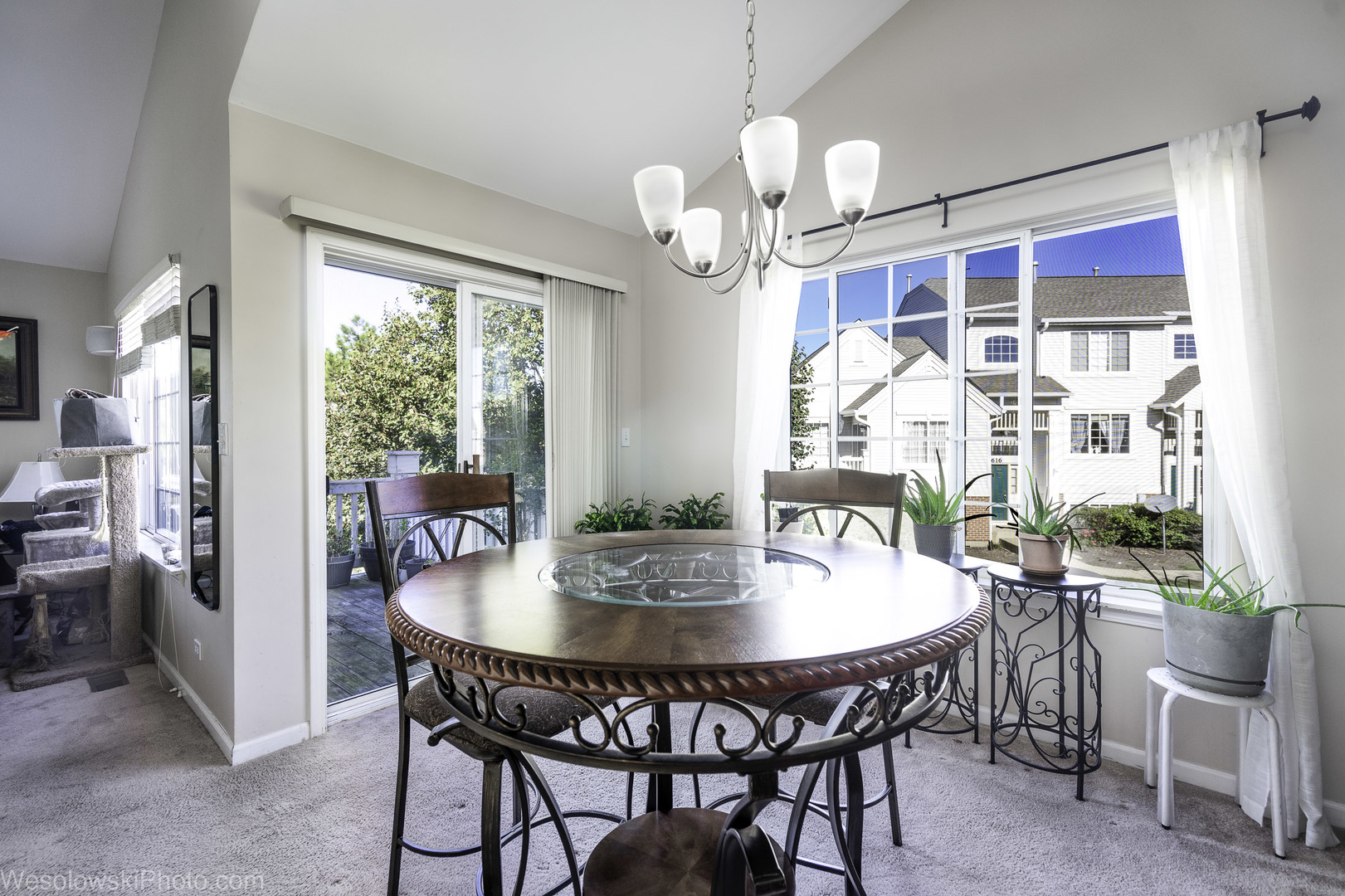 644 South Rosehall Lane, Unit 644 Round Lake, IL 60073 - Photo 13 of 33 a view of a dining room with furniture window and outside view