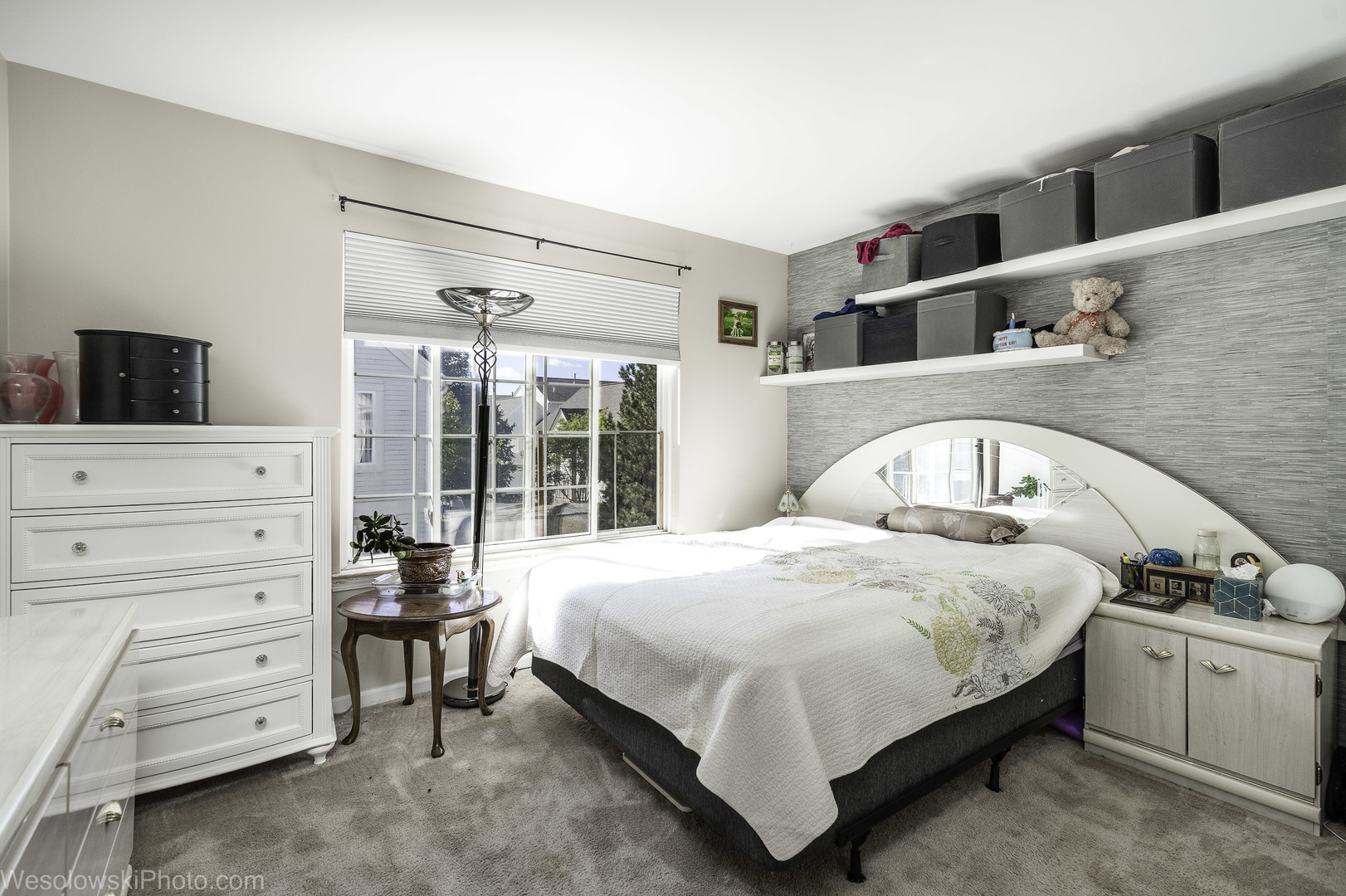 644 South Rosehall Lane, Unit 644 Round Lake, IL 60073 - Photo 16 of 33 a bedroom with a bed and a dresser