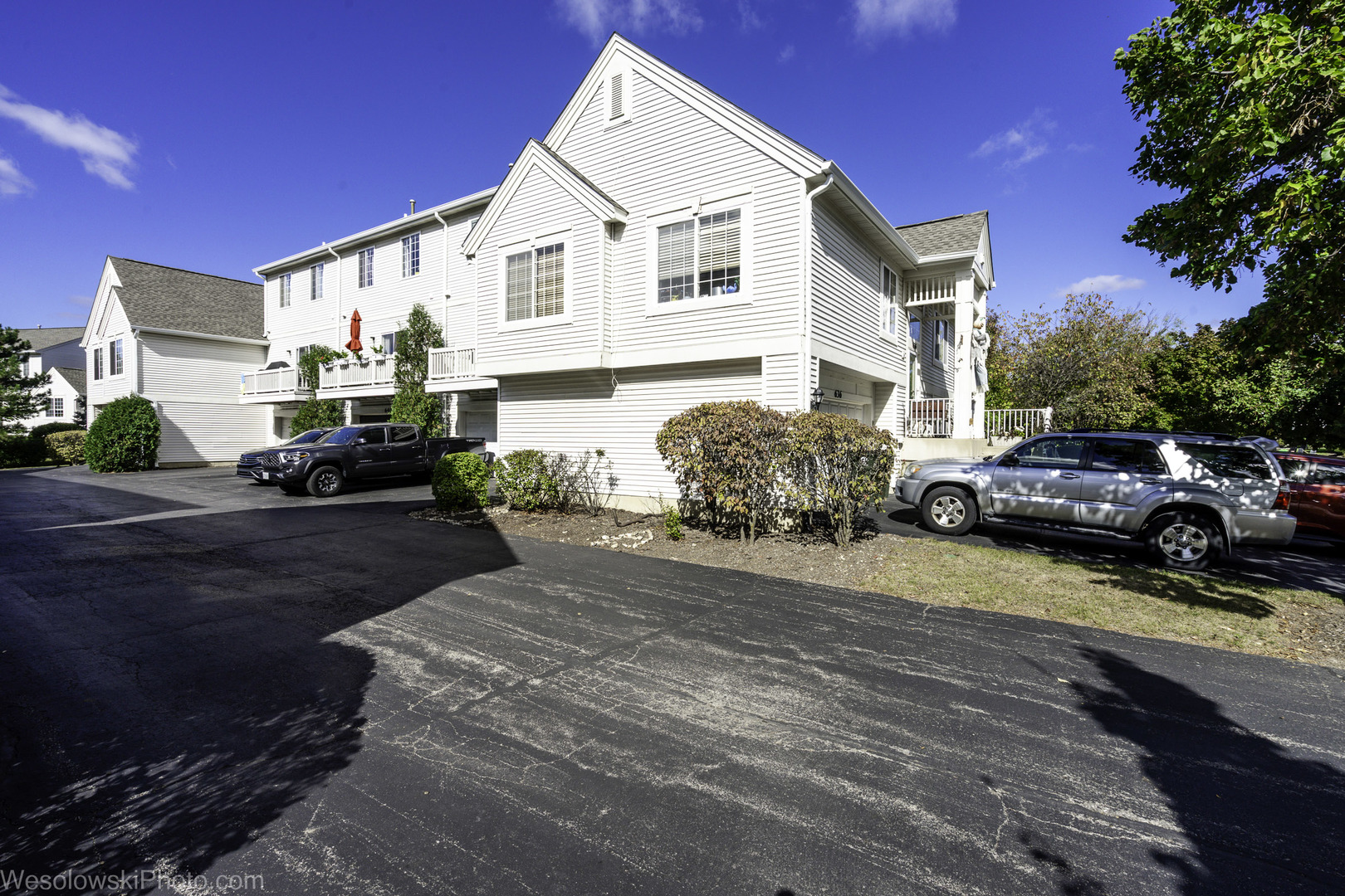 644 South Rosehall Lane, Unit 644 Round Lake, IL 60073 - Photo 25 of 33 a view of a car park in front of a house