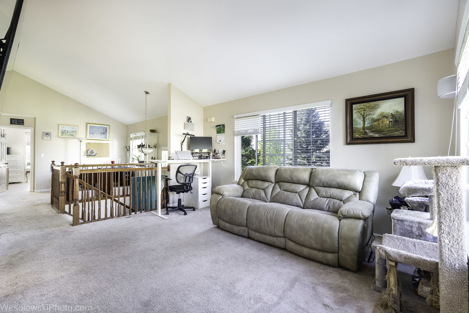 644 South Rosehall Lane, Unit 644 Round Lake, IL 60073 - Photo 5 of 33 a living room with furniture and a flat screen tv