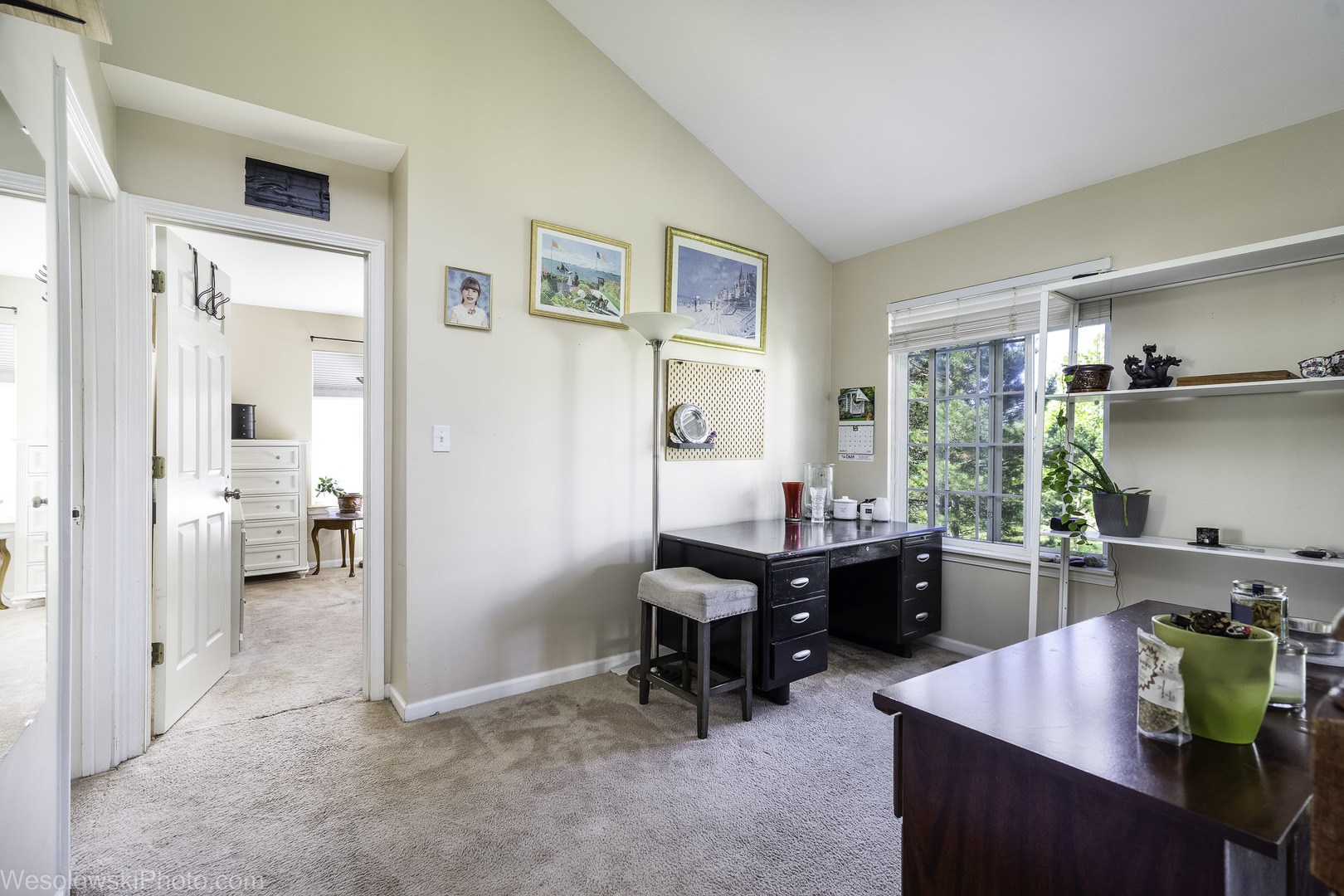 644 South Rosehall Lane, Unit 644 Round Lake, IL 60073 - Photo 8 of 33 a living room with furniture and a window