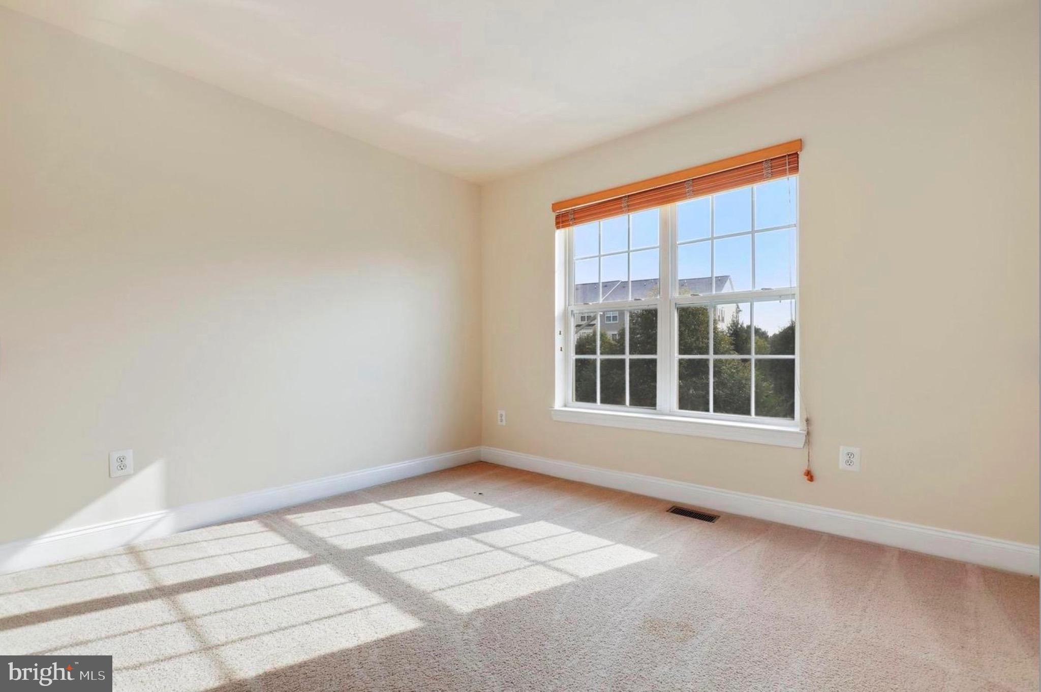680 Orchard Ridge Drive, Unit 100 Gaithersburg, MD 20878 - Photo 21 of 25 a view of an empty room with a window