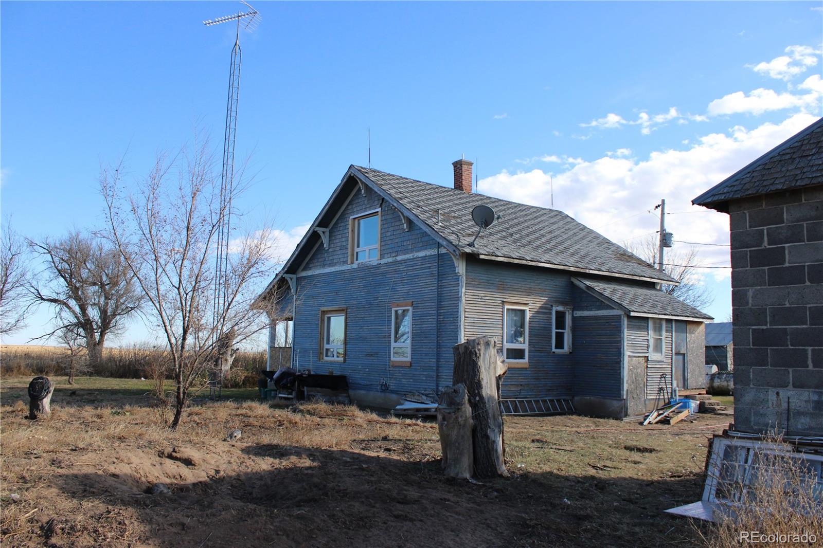 1901 County Road East Joes, CO 80822 - Photo 17 of 42 a view of a house with a yard